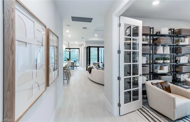 Foyer - Enclosed den located to the right with French doors