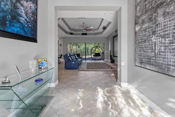 Hallway with a raised ceiling
