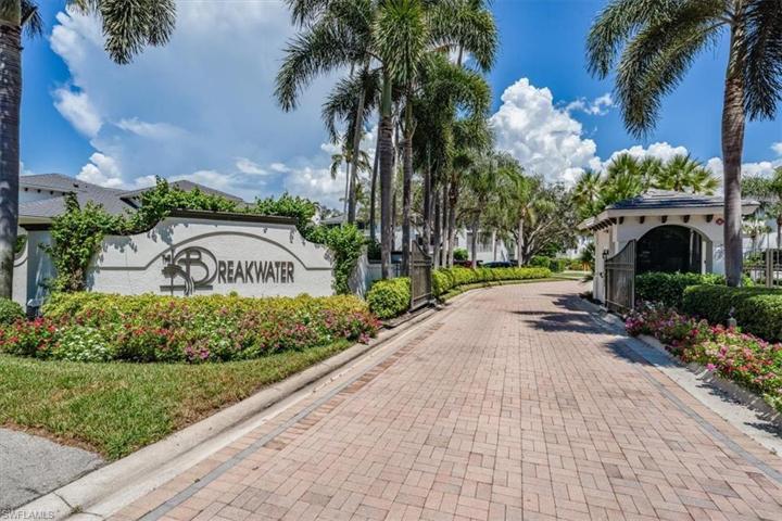 gated entrance including a private gate to sidewalk