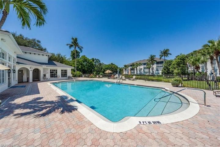 large neighborhood pool offering plenty of room to relax