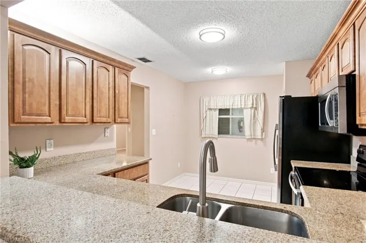 749 Landover Cir 203, Naples, Florida 34104