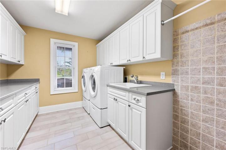 First floor laundry room with doggie wash station