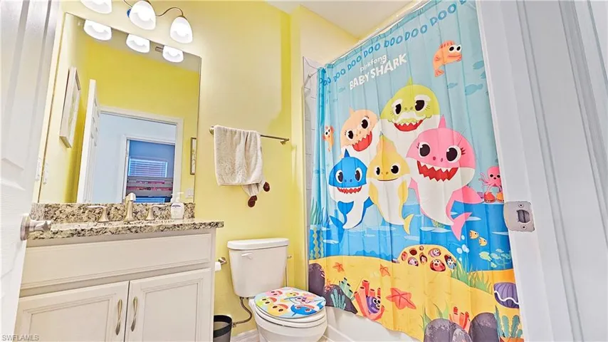 Bathroom with vanity and toilet