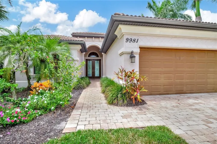 Mediterranean / spanish-style home featuring a garage
