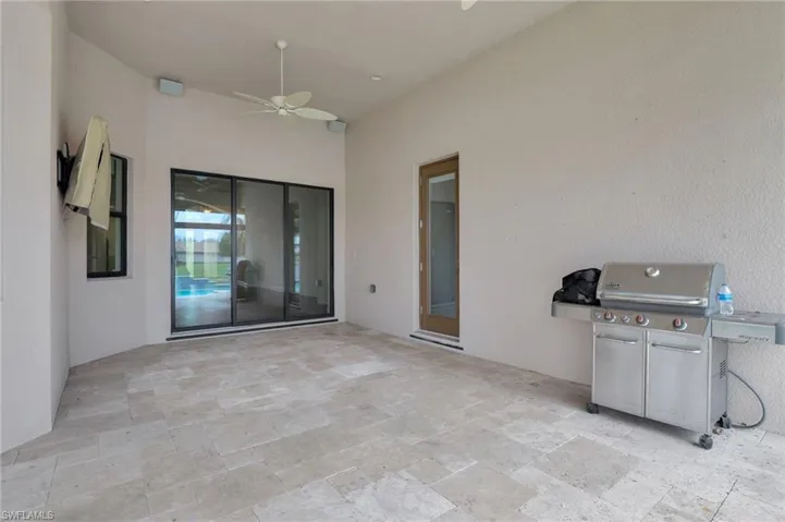 View of patio / terrace featuring ceiling fan and area for grilling