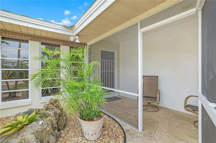 Entrance to property with a patio