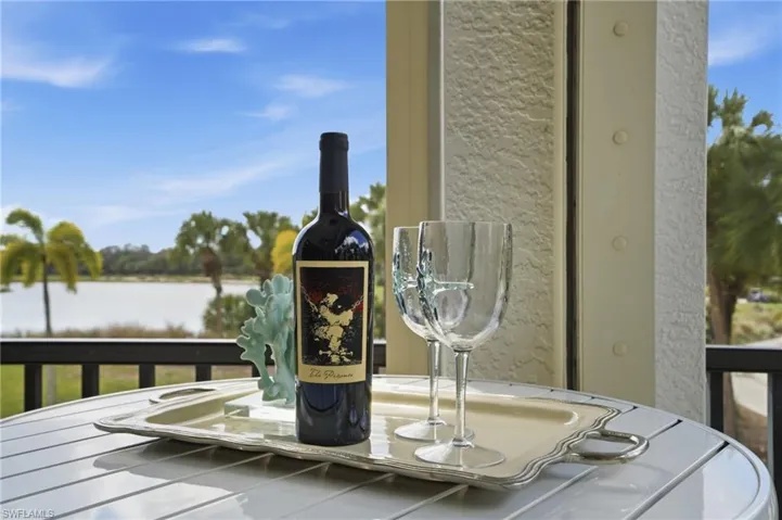 Miromar Lakes hole #14 Endless golf course and water views on a wide corner lot