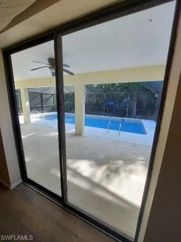 Doorway featuring a sunroom