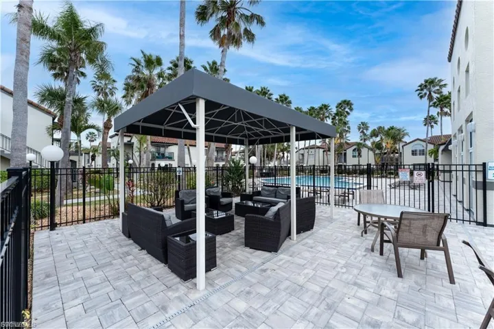 View of patio / terrace featuring an outdoor hangout area, a community pool, and outdoor dining space
