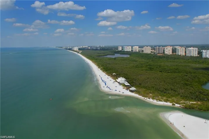 Aerial view of expansive Pelican Bay beach