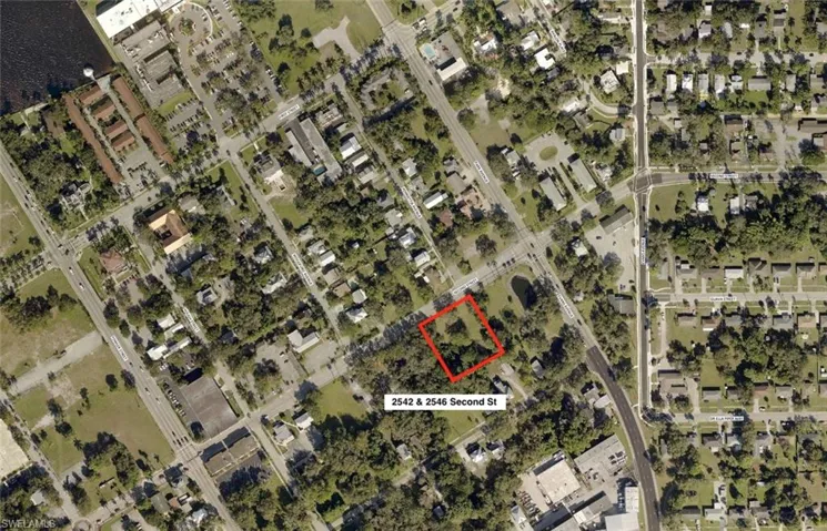 Aerial map of property and surrounding area with property boundaries highlighted