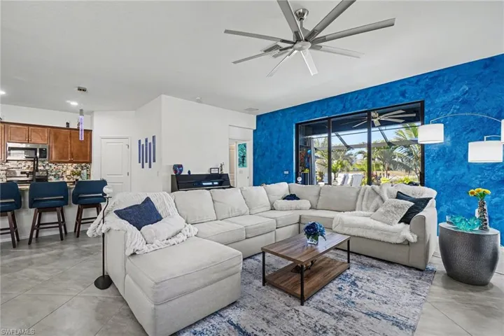 Living area with a ceiling fan