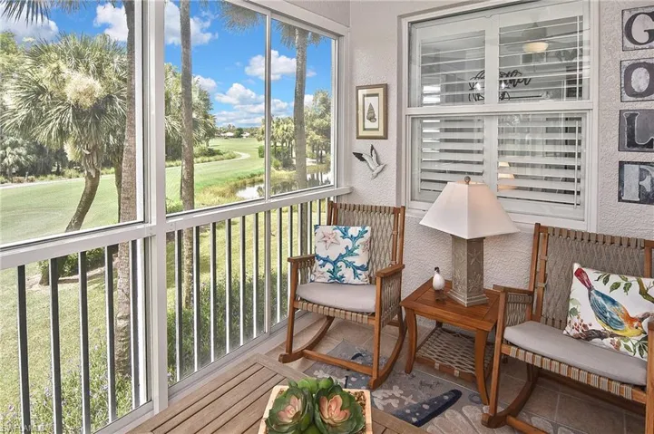 Sunroom / solarium with golf course view