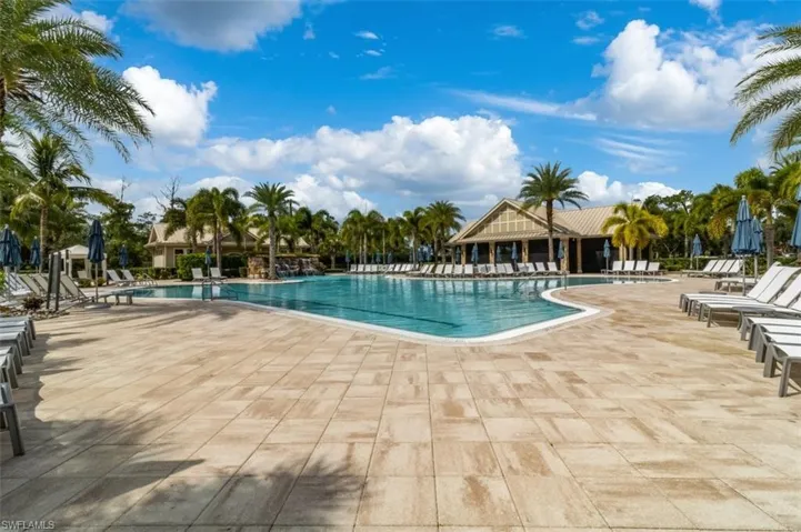Community pool featuring a patio area