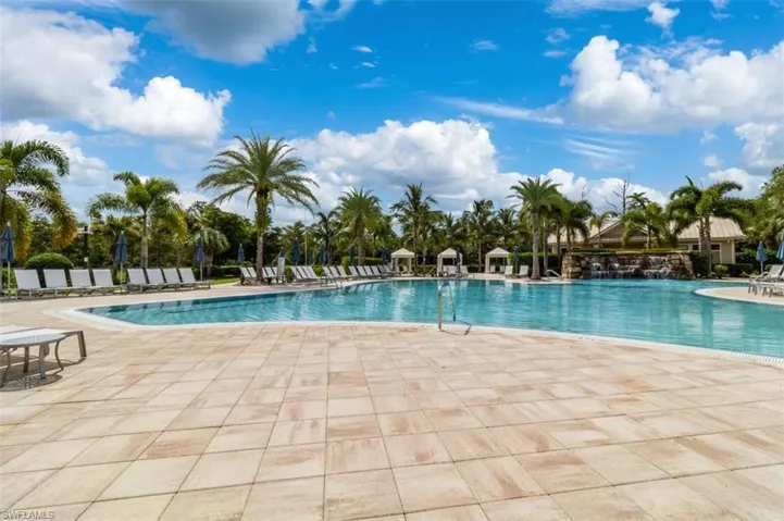 Community pool with a patio area