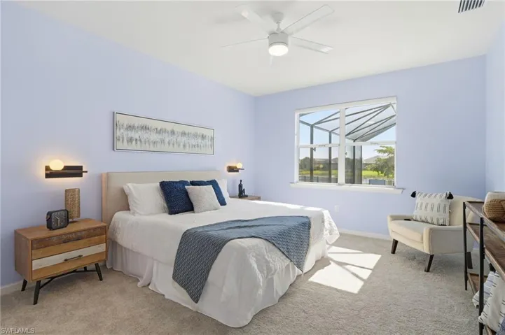 1st floor Bedroom featuring carpet floors and a ceiling fan
