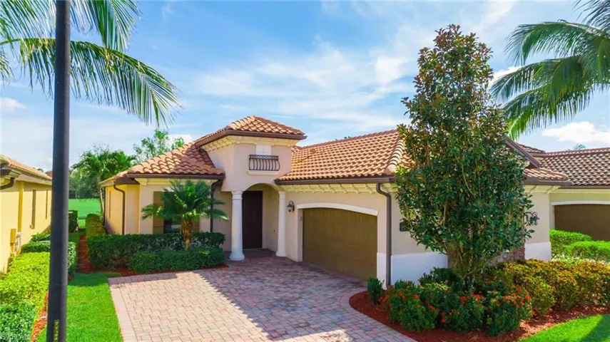 Mediterranean / spanish-style house featuring a garage