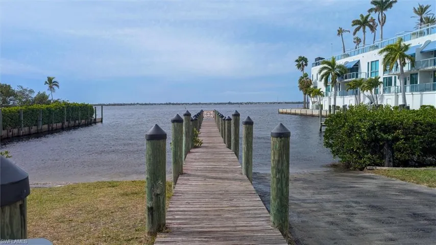Dock featuring a water view