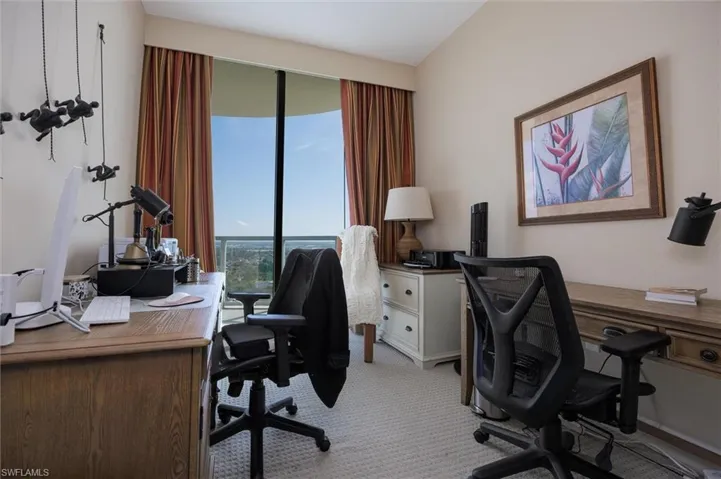 Office area featuring light colored carpet