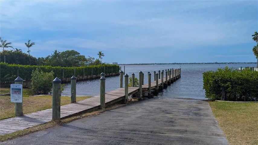 Dock with a boat ramp and a water view