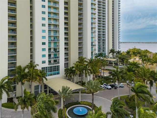 View of apartment building / complex with a water view