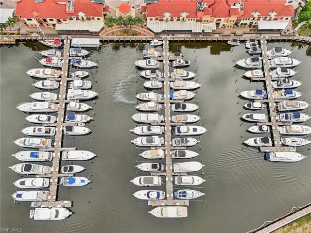 Aerial view of a large body of water and a marina
