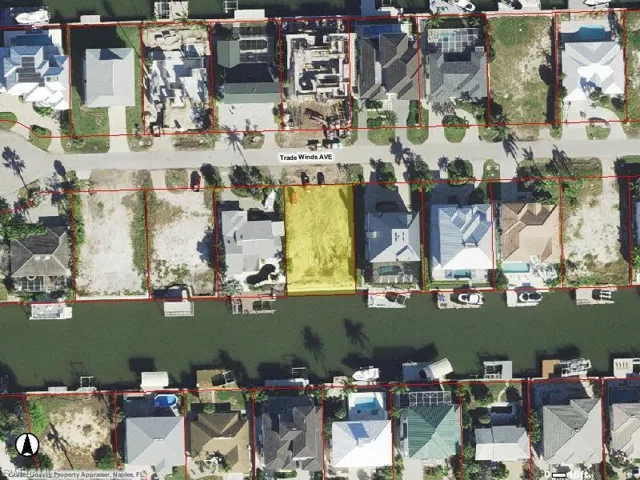 Aerial image of 318 Trade Winds Ave - southern exposure from the future swimming pool and boat dock