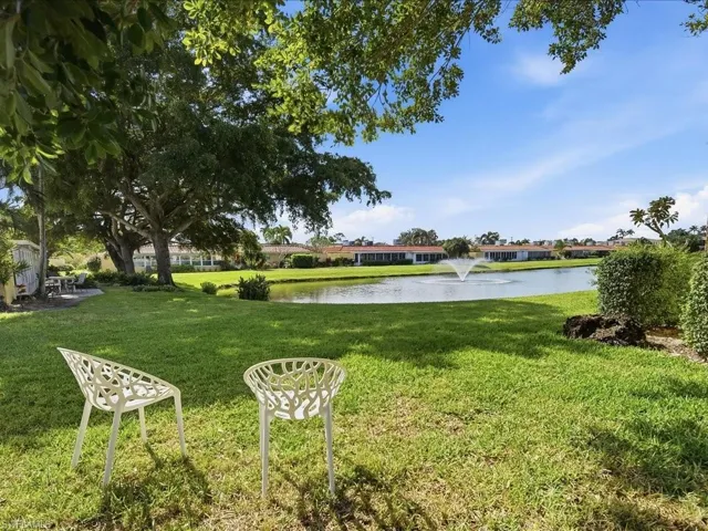 View of grassy yard featuring a water view
