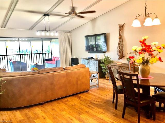 GREAT ROOM OPEN TO 28'X9' LANAI WITH GOLF COURSE VIEWS