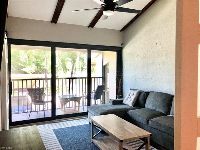DEN--WITH HURRICANE SLIDING GLASS DOOR TO FRONT BALCONY