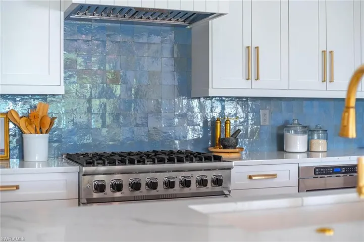 Handmade tile back splash 6 burner gas range