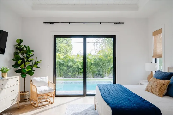 Primary suite opens to backyard pool