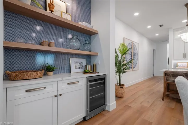 Tastefully tiled wall with floating shelves