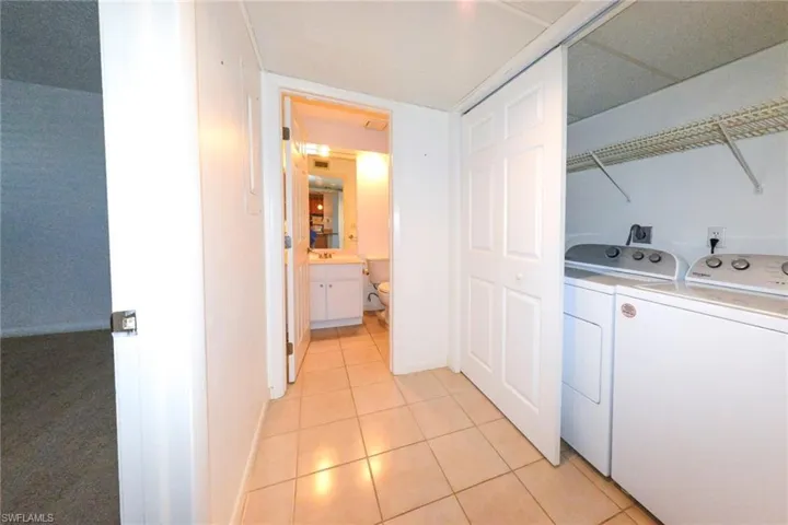 Laundry area near second bathroom