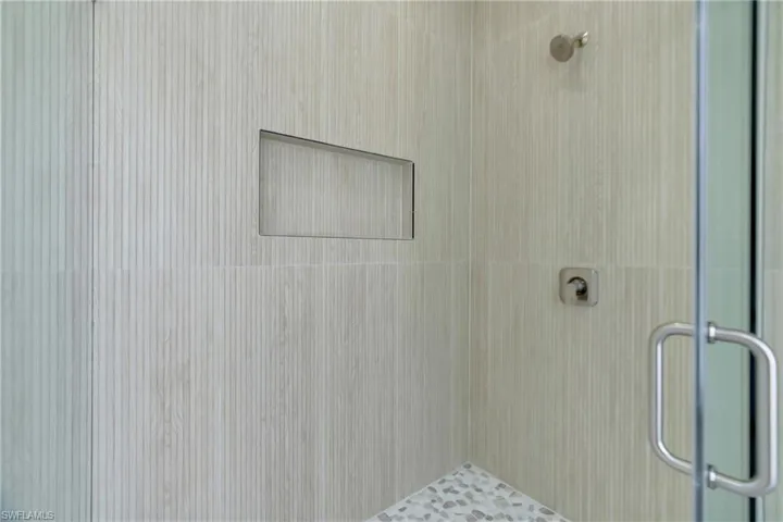 Bathroom featuring a shower stall