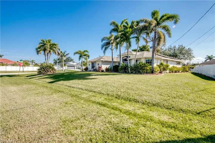 View of yard with a garage