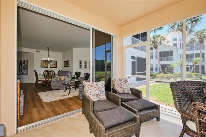 Sunroom with a chandelier