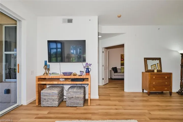 Living room with wood finished floors and baseboards