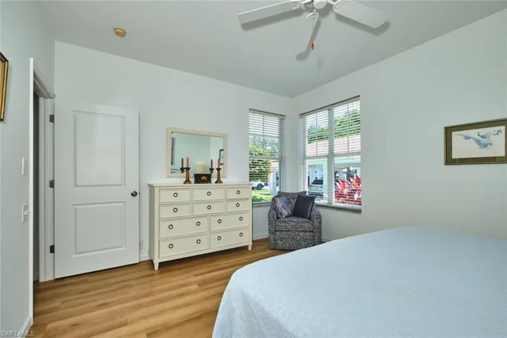 Bedroom featuring light wood-style flooring and ceiling fan