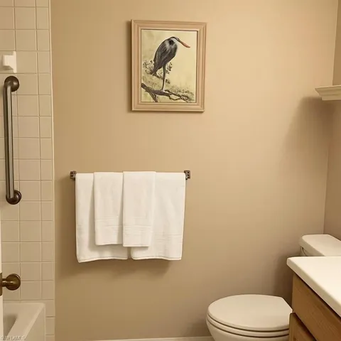 Bathroom with vanity and shower / bathtub combination