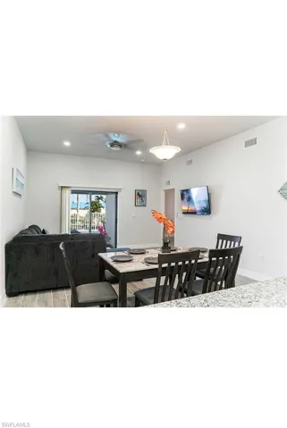 Dining space featuring ceiling fan