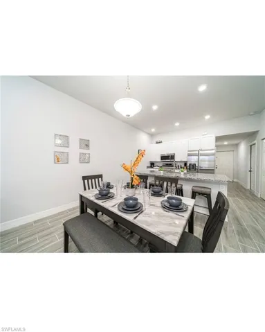 Dining space featuring light hardwood / wood-style flooring