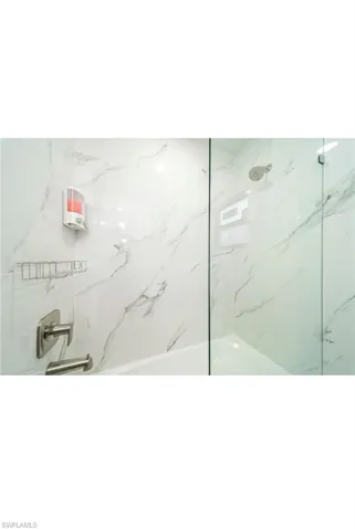 Bathroom with tiled shower