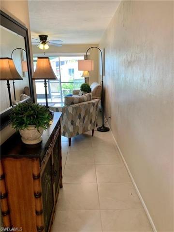Entry into Living Room overlooking Lanai with view to Pool (in Back)