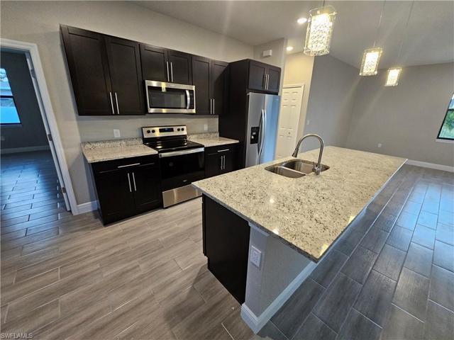 1015 NW 19th  PL, Cape Coral, FL 33993