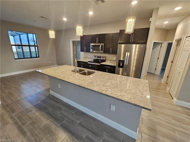 1015 NW 19th  PL, Cape Coral, FL 33993