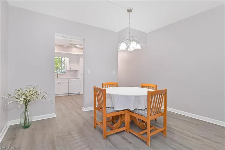 Bedroom featuring wood finished floors and a ceiling fan
