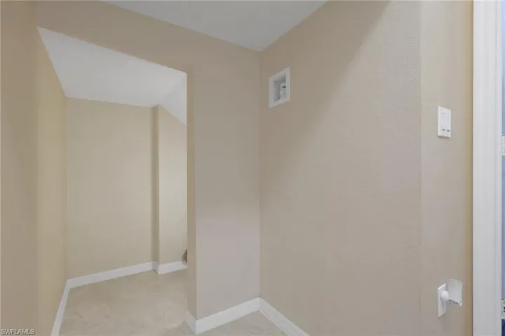 Under-stair storage space.