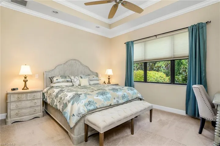 Owner's suite is spacious and inviting, with tray ceilings, crown molding, and large his/her closets.