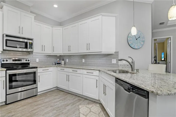 Kitchen is perfect for entertaining guests and includes under counter and over counter motion sensor lighting, and lots of counter space for preparing meals.